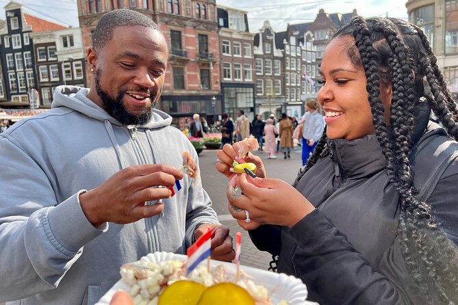 10 Tastes of Amsterdam: Food Tour by UNESCO Canals and Jordaan - Cheese, liquor, and a cellar start
