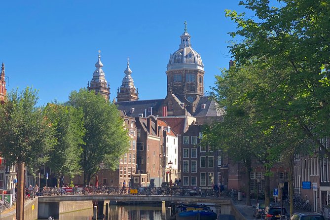 Absolutely Amsterdam - the Essential Introductory Walking Tour - Oostindisch Huis and the cost of the Golden Age