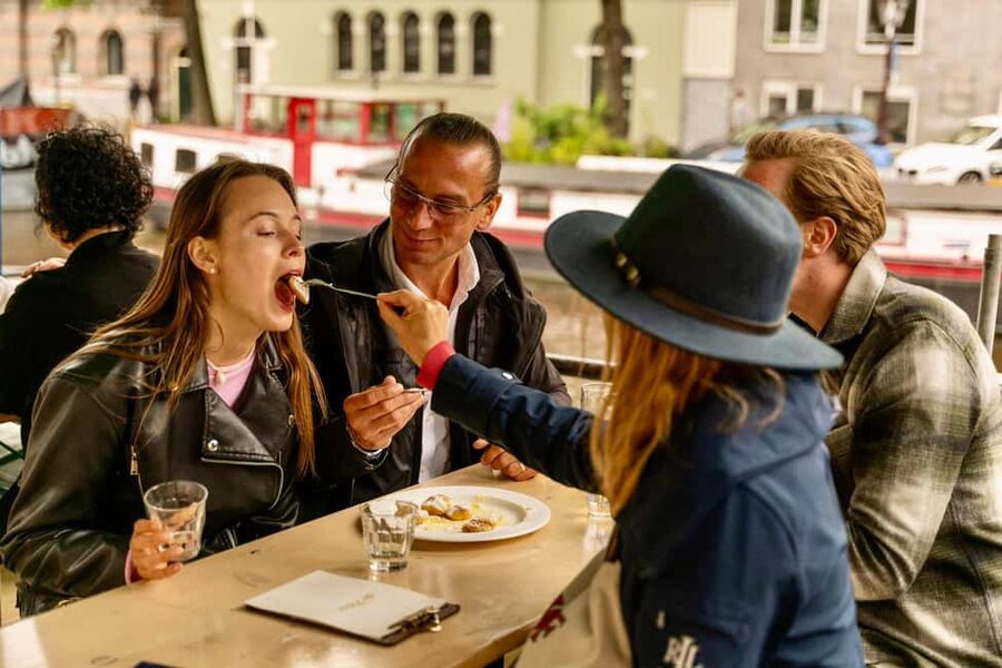Amsterdam: 10 Tastings Guided Food Tour by UNESCO Canals - Spui and the first neighborhood stories