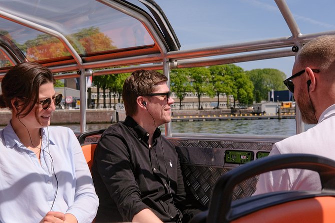 Amsterdam 1h Canal Cruise by Semi-Open Boat with Audio Guide - The Hermitage, Rijksmuseum, and Heineken’s old brewery