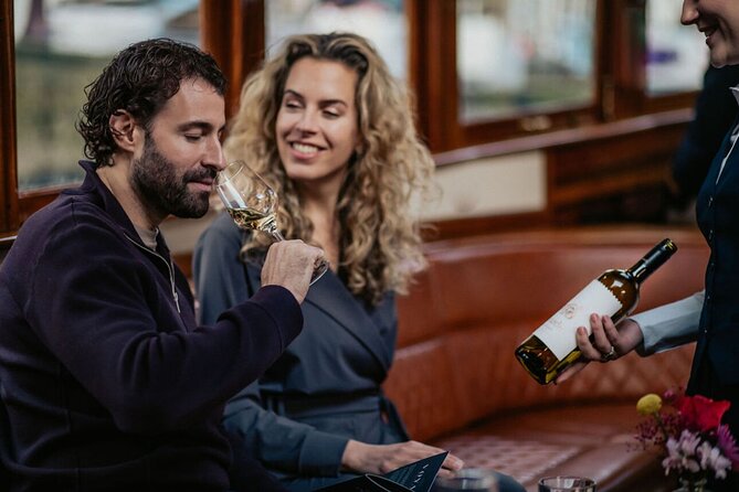 Amsterdam: 2-Hour Canal Cruise incl. Drinks & Dutch Snacks - Munt Tower, Bartolotti House, and unusual city sights