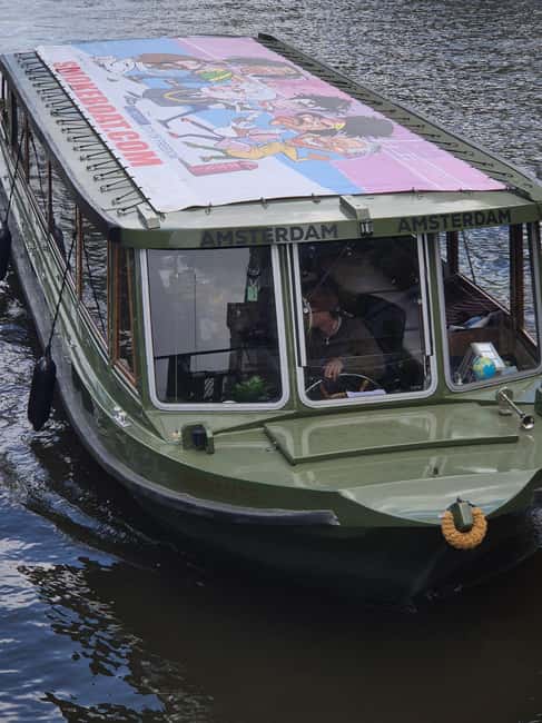 Amsterdam: 420 Smoke-Friendly Boat Tour - Cruising the canals with reggae in the background