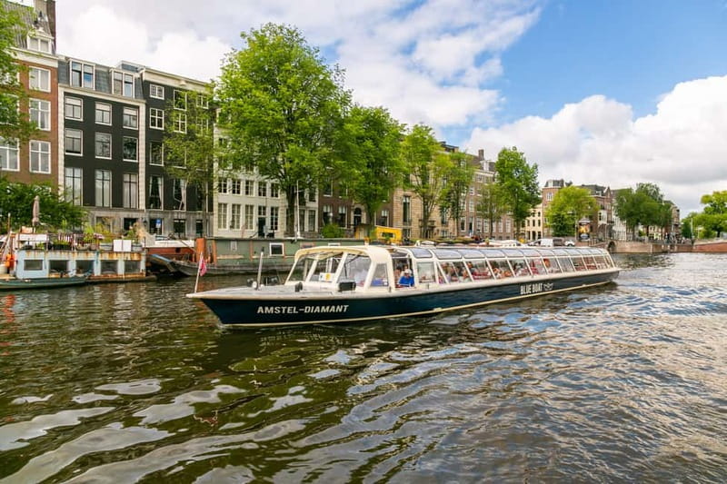 Amsterdam: 75 Minute City Canal Cruise with Audio Guide - Herengracht and the route toward Amsterdam Centraal