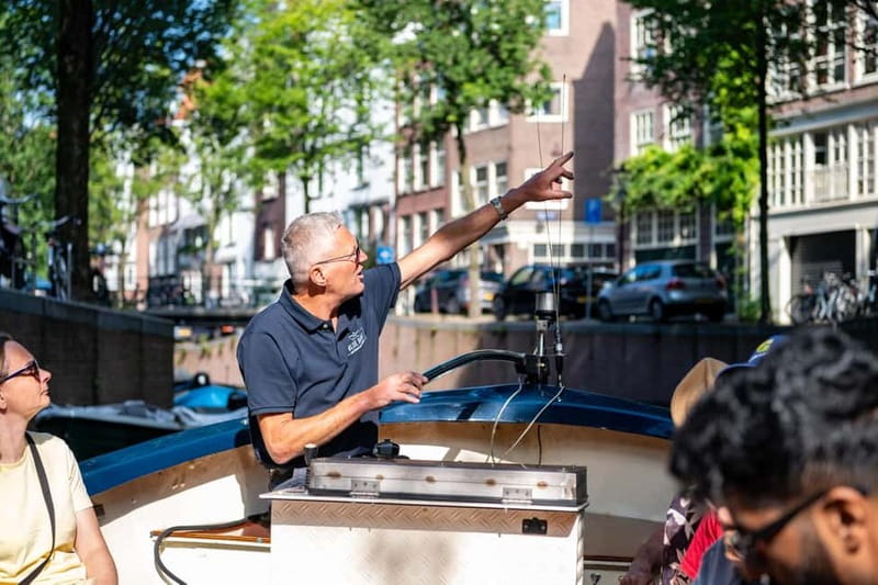 Amsterdam: 75 minute Open Boat Canal Cruise with Live Guide - Key points to know before booking