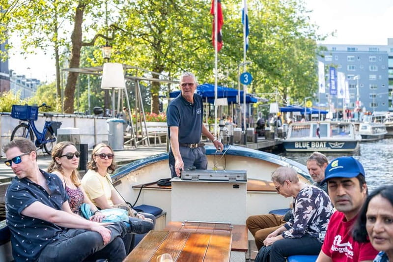 Amsterdam: 75 minute Open Boat Canal Cruise with Live Guide - Why a small open boat changes the Amsterdam cruise