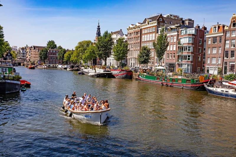 Amsterdam: 75 minute Open Boat Canal Cruise with Live Guide - Amsterdam Centraal and the open view toward the IJ River