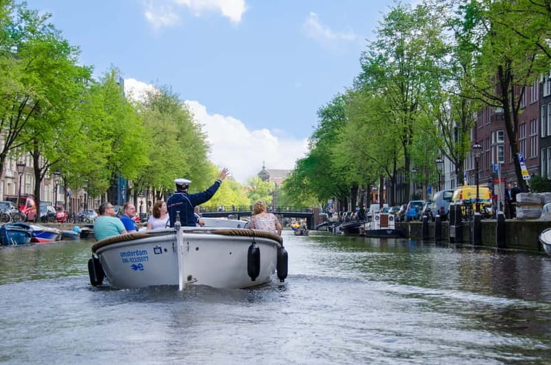 Amsterdam: 75 minute Open Boat Canal Cruise with Live Guide - Starting at Leidseplein near the Hard Rock Cafe