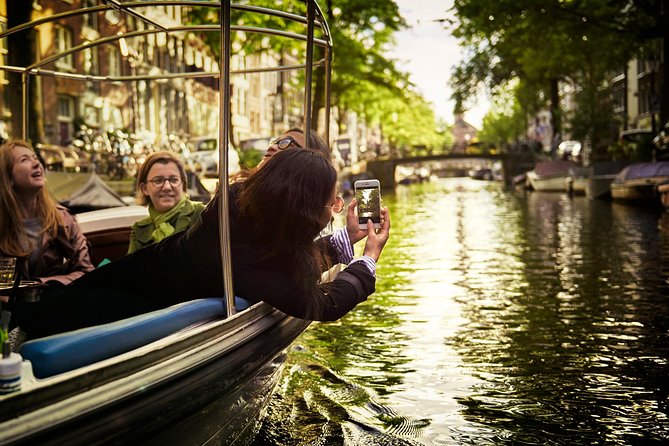 Amsterdam 90-min Private Canal Cruise with Live Guide and Drinks - Key things to know before booking