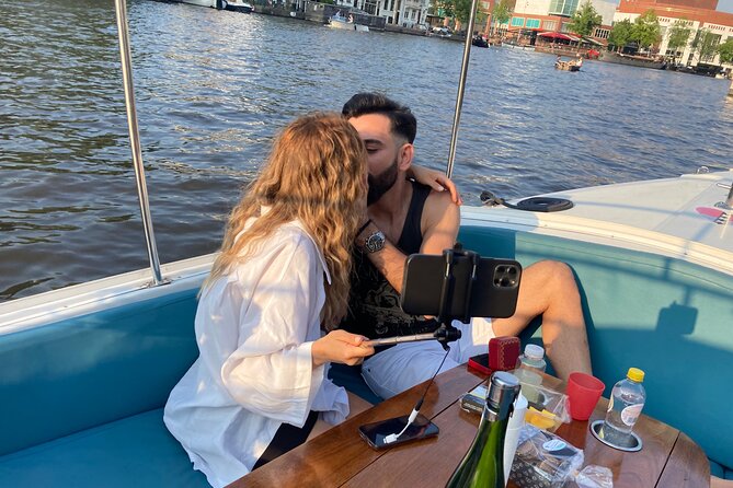 Amsterdam 90-min Private Canal Cruise with Live Guide and Drinks - Through the UNESCO canal belt and the Golden Bend