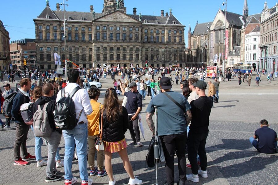 Amsterdam: Anne Frank Guided Small Group Walking Tour - Nieuwezijds Voorburgwal and the changing city