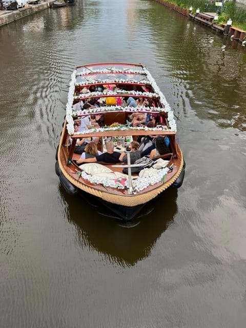 Amsterdam: Boat Tour with Optional Unlimited Drinks - Montelbaanstoren and the old canal neighborhoods