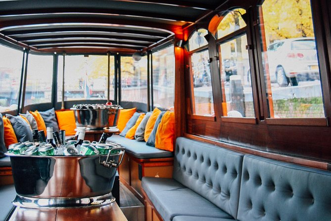 Amsterdam Canal Cruise in Classic Salon Boat With Drinks and Cheese - What Happens During the One-Hour Ride