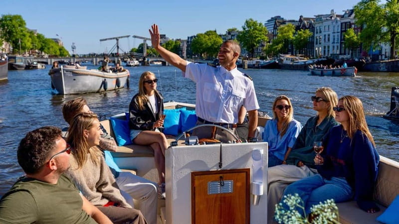 Amsterdam: Canal Cruise in Open Boat with Drink Option - Westerkerk, Prinsengracht, and the Nine Streets