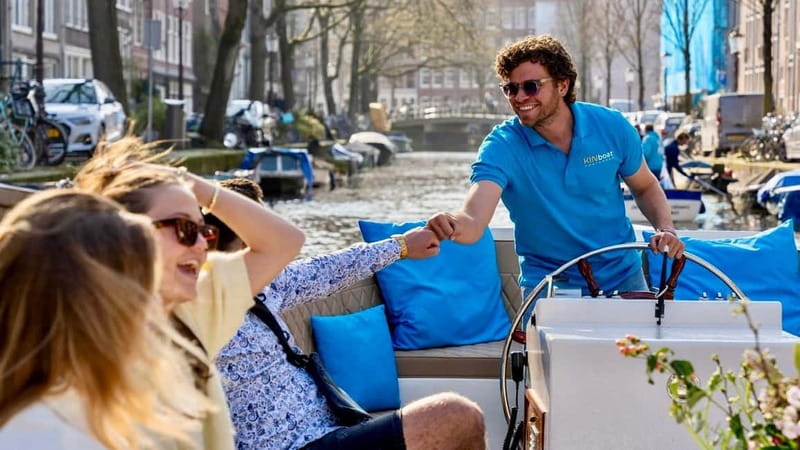 Amsterdam: Canal Cruise in Open Boat with Drink Option - Boat comfort, drinks, and weather