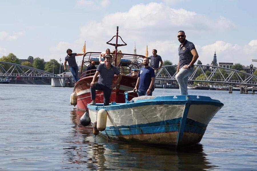 Amsterdam: Canal Cruise on a Wooden Refugee Boat - Who will appreciate this Amsterdam boat ride