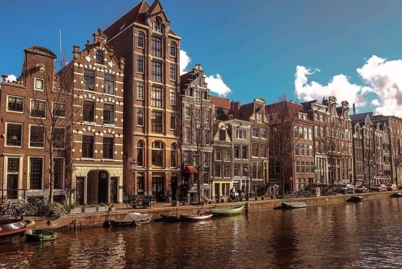 Amsterdam canal cruise with culinary burger or cheese & wine - The Nine Streets and Herengracht from water level