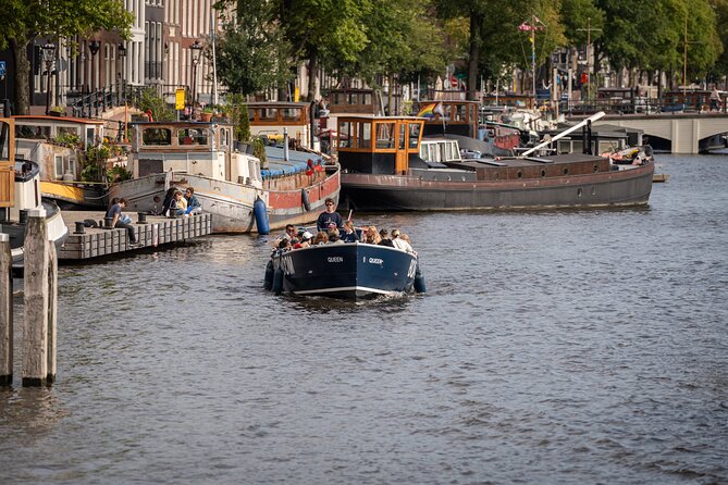 Amsterdam Canal Cruise with Live guide & Two drinks - Central St. - Central Station from the water