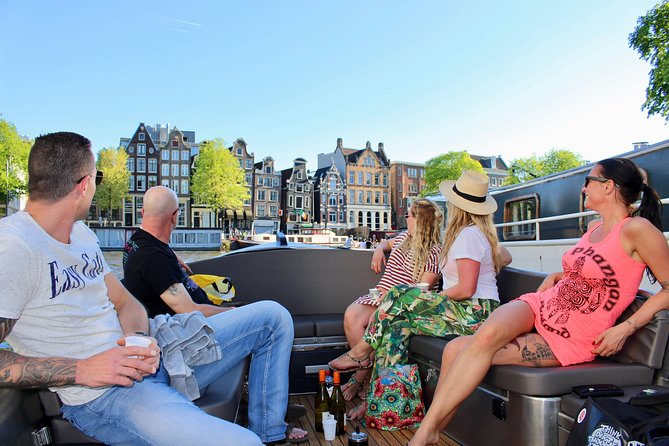 Amsterdam Canal Tour by Open Boat – 90 min Small Group Experience - Why a small open boat changes the experience