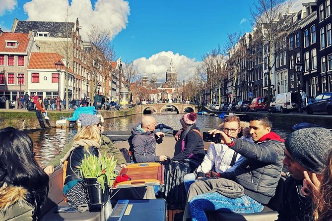 Amsterdam Canal Tour by Open Boat – 90 min Small Group Experience - Quiet canals and reminders of Amsterdam’s defenses