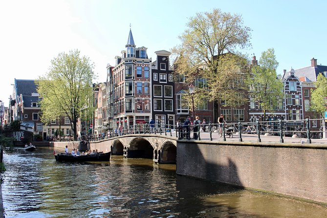 Amsterdam Canal Tour by Open Boat – 90 min Small Group Experience - The Seven Bridges and Prinsengracht