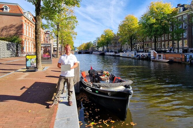 Amsterdam Canal Tour by Open Boat – 90 min Small Group Experience - Finishing beneath the Skinny Bridge