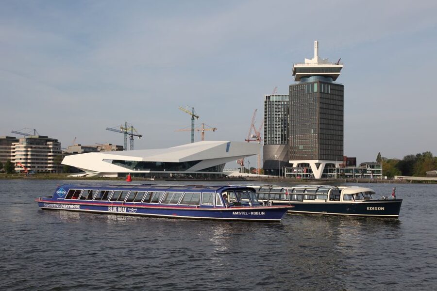 Amsterdam: City Canal Cruise & Straat Museum - Taking the NDSM Ferry