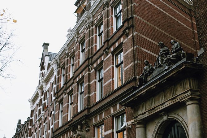Amsterdam City Center & History - Exclusive Guided Walking Tour - From St. Nicholas Basilica to Amsterdam’s old harbor