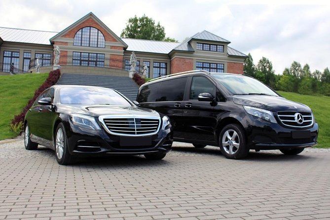 Amsterdam City to AMS Schiphol Airport departure transfer - Hotel pickup, luggage help, and the first few minutes