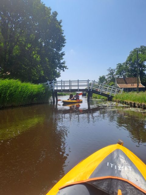 Amsterdam: Countryside Bike and Kayak Guided Tour - The break, village atmosphere, and food