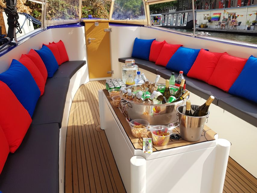 Amsterdam: Covered Canal Booze Cruise with Unlimited Drinks - Central Station and Oudeschans