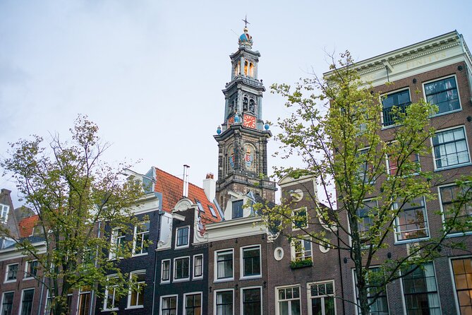 Amsterdam: Cultural Highlights in English/German/Italian - Magna Plaza and the changing city center
