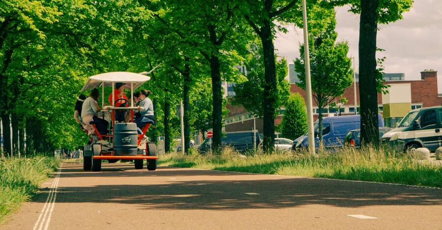 Amsterdam: Dutch Beer Bike Blast Tour with Onboard Bar - The 65-minute ride through Sloterdijk