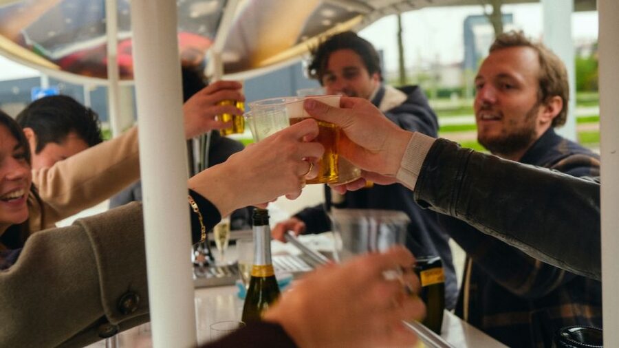 Amsterdam: Dutch Beer Bike Blast Tour with Onboard Bar - Rain cover, lights, and the practical design