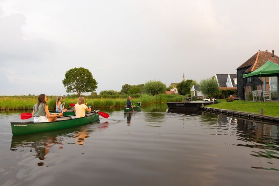 Amsterdam: Dutch Countryside Sunset Canoe Tour - A drink in a village home before paddling