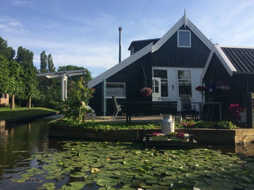 Amsterdam: Dutch Countryside Sunset Canoe Tour - Canoeing through farms, mills, and polder country