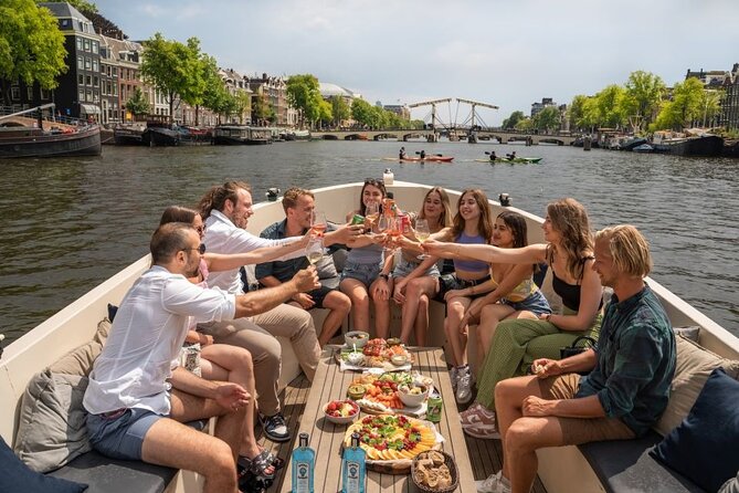 Amsterdam: Evening Candle Light Cruise With Wine & Cheese - Red Light District and the oldest Gothic building