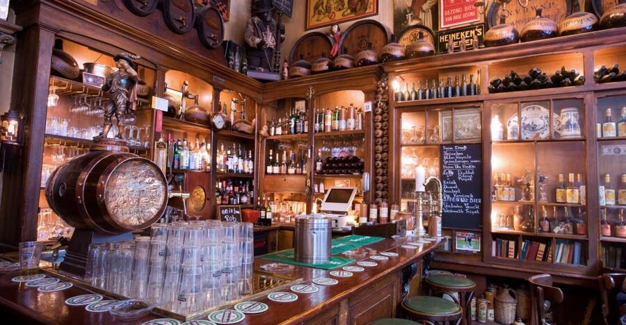 Amsterdam: Exclusive Red Light District Tour and Drink - Oude Kerk and the Red Light District’s older roots