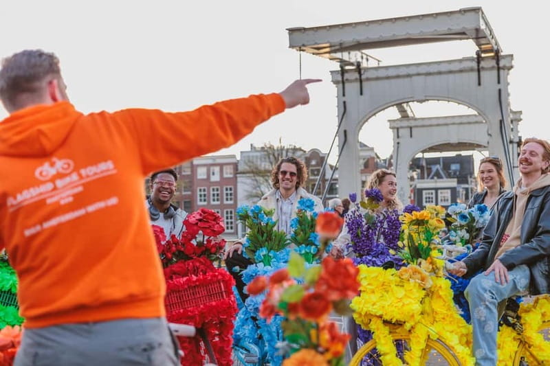 Amsterdam: Explore Canals, Guided Tour on Flower Bikes - Dam Square and the Return Ride