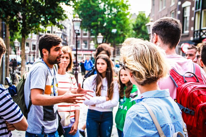 Amsterdam full day tour: Walking, Biking and Cruising - Meeting the Guide at Beursplein