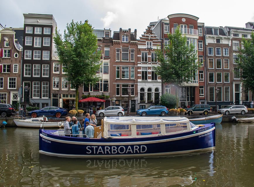 Amsterdam: German Guided Canal Cruise with on Board Bar - Zuiderkerk, Munttoren, and the old city center