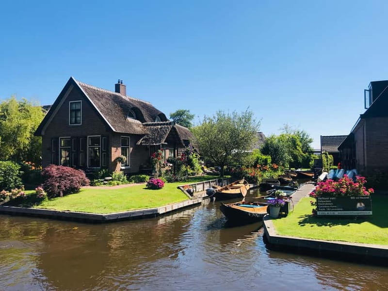 Amsterdam: Giethoorn, Afsluitdijk and Zaanse Schans Day Trip - Zaanse Schans: windmills, cheese, and wooden shoes