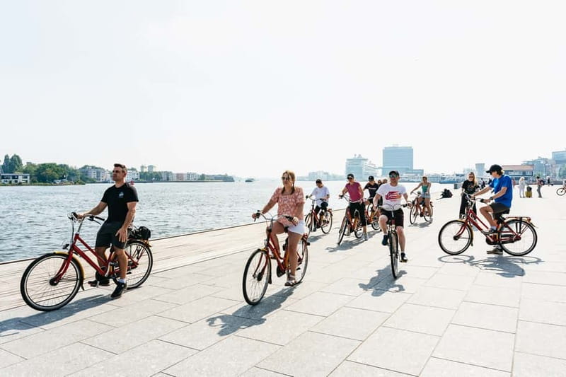 Amsterdam: Guided Bike Tour City Centre in EN/DE/FR/ES - Westerkerk, the Anne Frank House, and Leidseplein