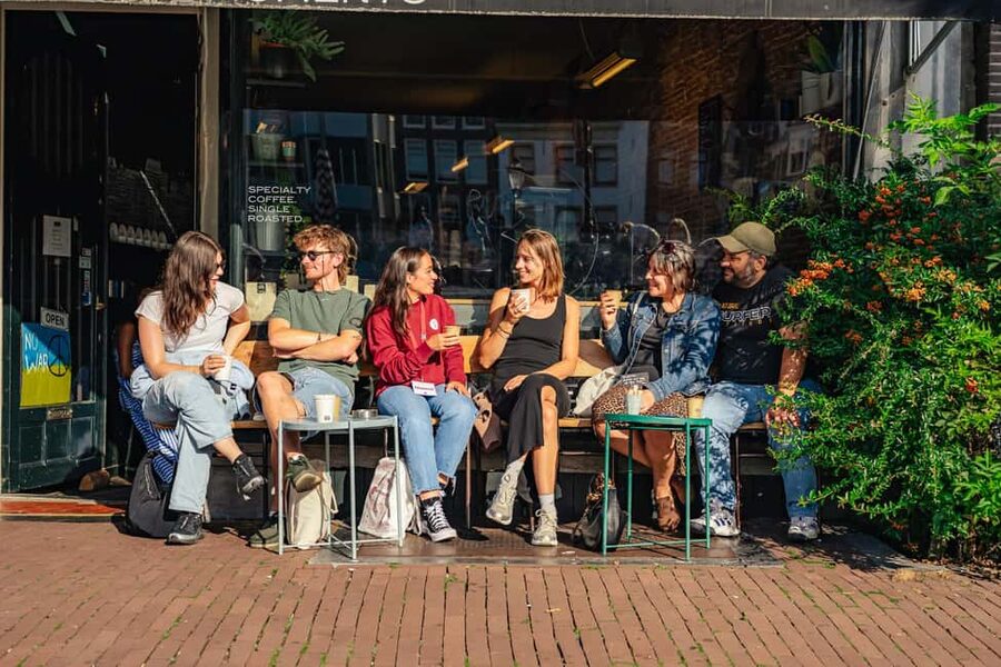 Amsterdam: Guided Cultural Food Tour in German or English - Meeting the guide at the National Monument