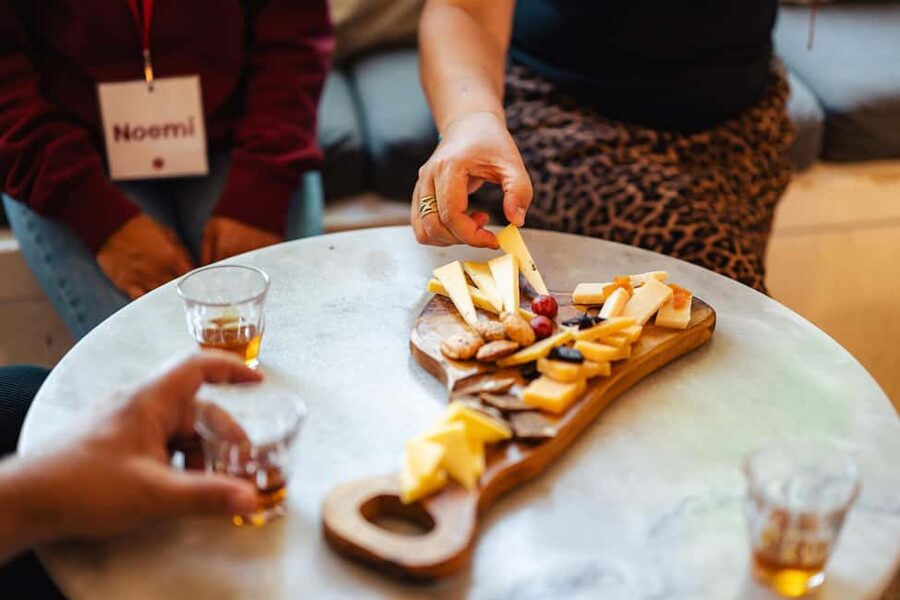 Amsterdam: Guided Cultural Food Tour in German or English - Damrak, the Beurs van Berlage, and Magna Plaza