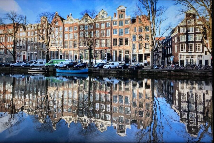 Amsterdam: Guided Off-The-Beaten-Track Walking Tour - Who should book this Amsterdam walk?