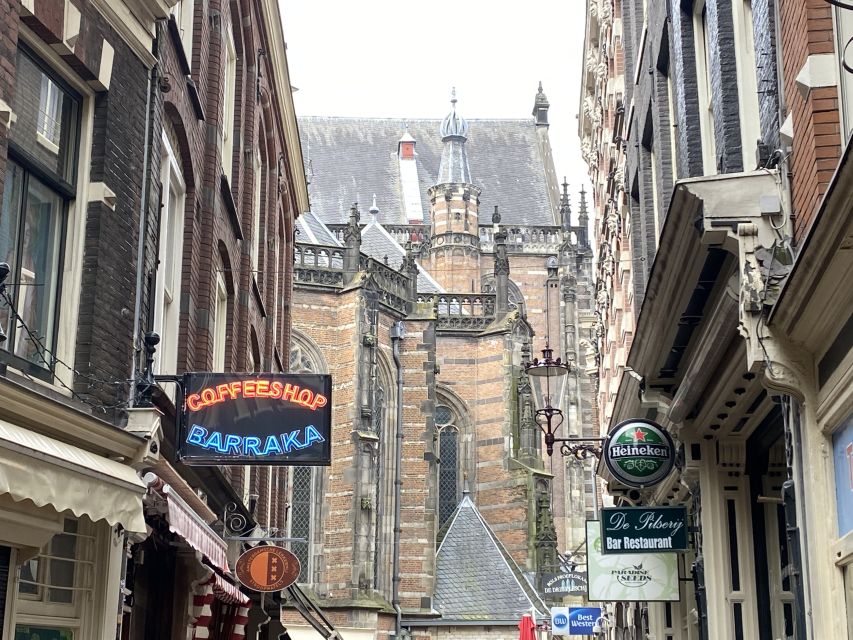 Amsterdam: Guided Off-The-Beaten-Track Walking Tour - Torensluis and the canal belt