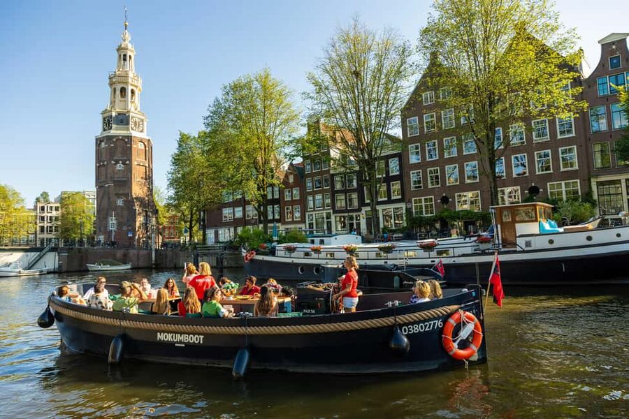Amsterdam: Guided Open Boat Canal Cruise Including Drink - The Seven Bridges and the canal belt