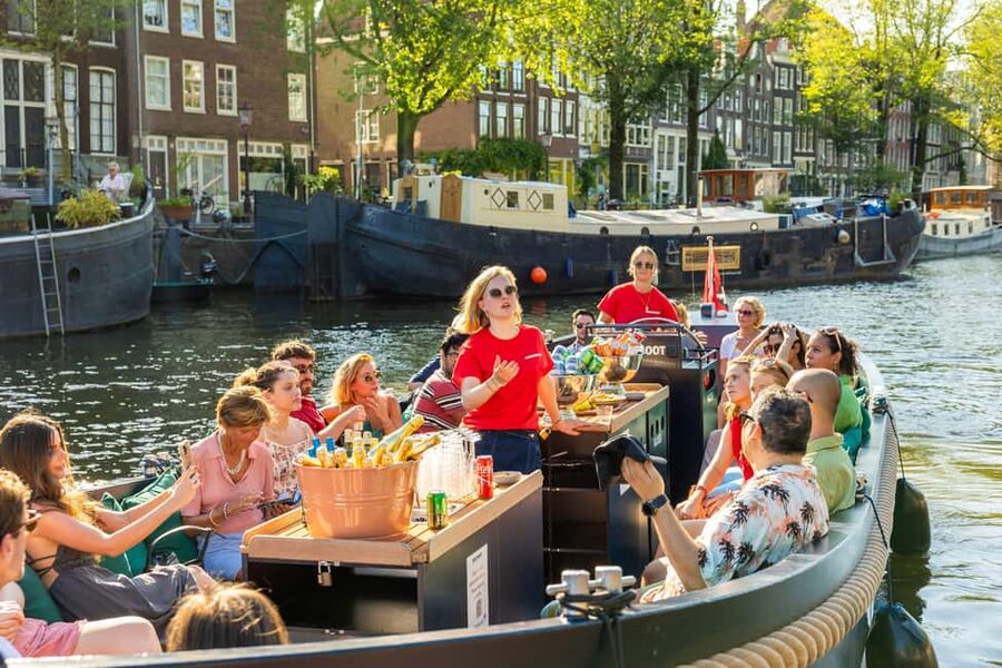 Amsterdam: Guided Open Boat Canal Cruise Including Drink - The western canals, Jordaan edge, and Anne Frank House