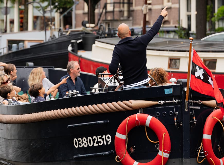 Amsterdam: Guided Open Boat Canal Cruise Including Drink - One drink, or the unlimited drinks upgrade