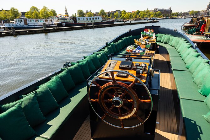 Amsterdam: Guided Open Boat Canal Cruise Unlimited Drinks Option - Key things to know before booking